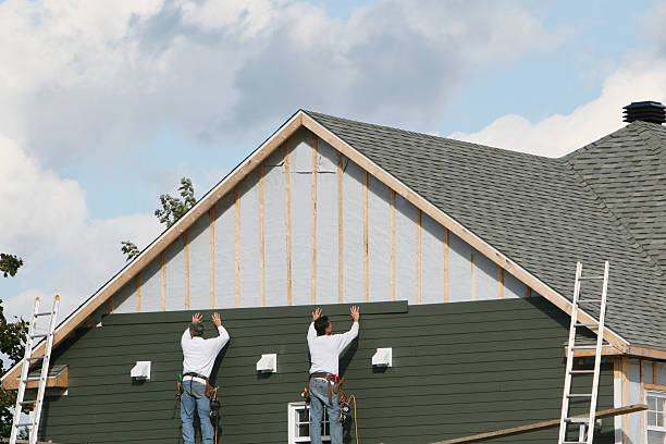 Professional Siding technician working in Williamston, NC